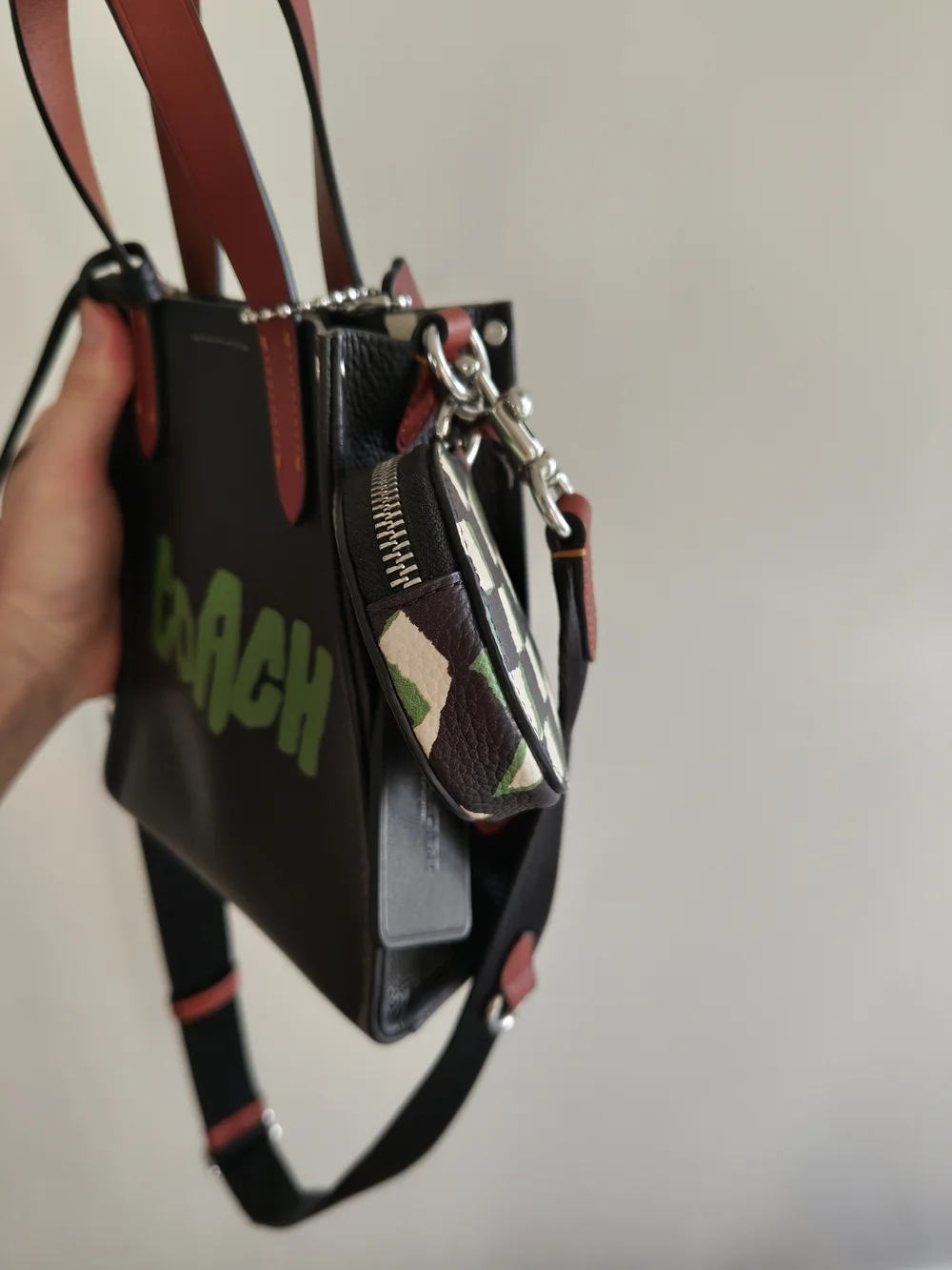 COACH Black Leather Graffiti Logo Tote with Burgundy Handles